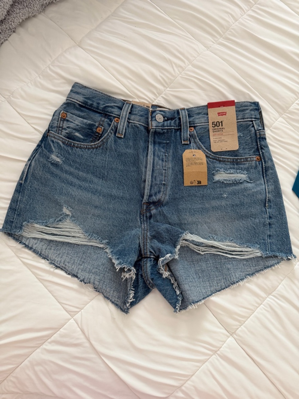 Levi's 501 Cutoff Distressed Denim Shorts in Blue